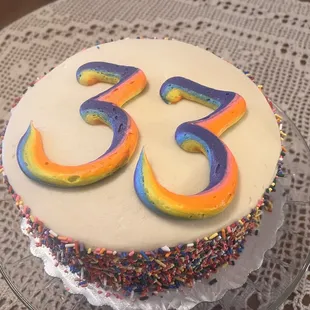 a cake decorated with the number 33