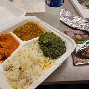 a meal in a styrofoam container