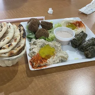 Appetizer Sampler: pita, Baba Ghanouj, Falafel, Hummus, Grape Leaves         Baba Ghanouj was my favorite! 1/30/22