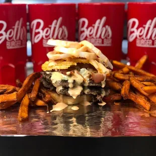 a cheeseburger with fries
