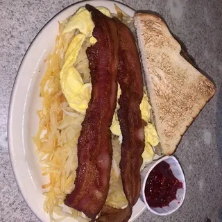 Two strips of bacon, hash browns one egg & one slice of toast