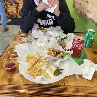 a man sitting at a table eating
