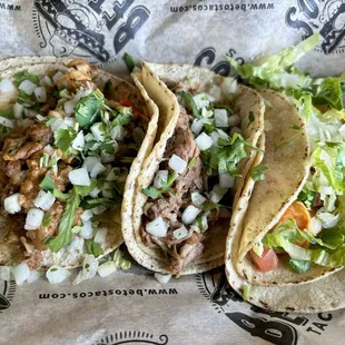 three tacoss on a wrapper