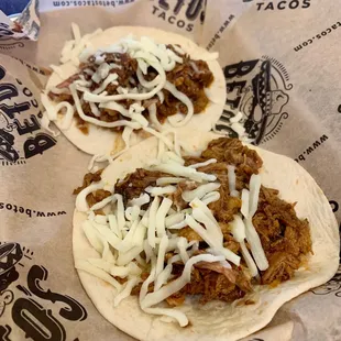Customized-for-a-kid barbacoa tacos with just meat and cheese