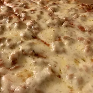 Large cheese and sausage pizza