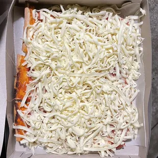 Pizza by the Cut (ordered 4 cuts with cheese on top, got 6!)