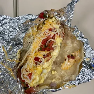 Bacon and Egg Taco with added pico and cheese