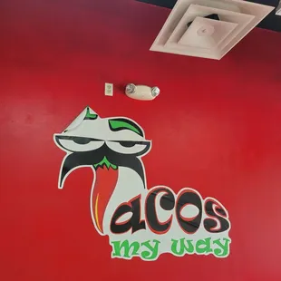 the logo on the wall