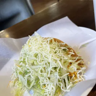 My delicious shredded beef taco filled with lettuce, cheese and beef
