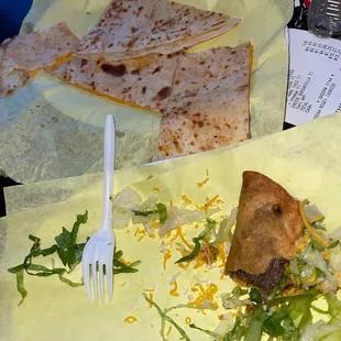 What&apos;s left of my quesadilla and beef taco, they overcooked the shell on the taco but it&apos;s still good!