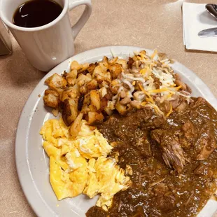 Chili Verde and Eggs with half potatoes and beans