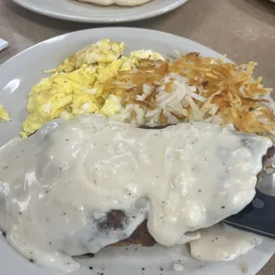 Chicken fried steak and eggs, hash browns, pancakes