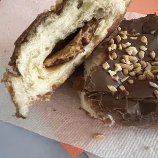 Peanut butter filled chocolate donut with peanuts.  Donut was very fresh, but I can go without the peanut butter.