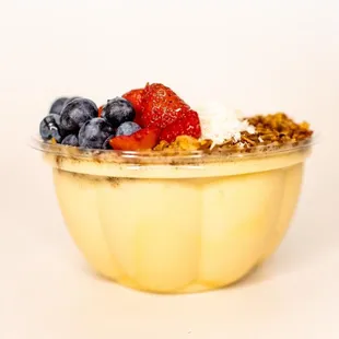 a bowl of yogurt with berries and granola