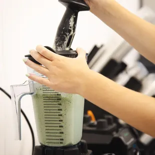a person using a blender