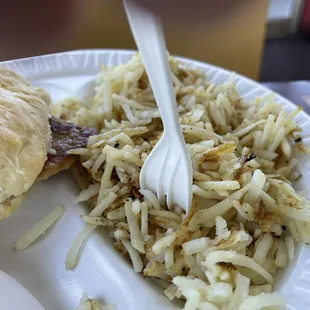My husband's "half order" of shredded hash browns. They also have shredded fried and tater tots!