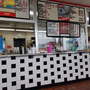 menus on the wall of a fast food restaurant