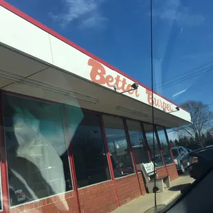 The restaurant is a little outdated, but the burgers are great!