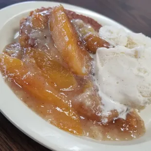 Warm peach cobbler &amp;  vanilla ice cream