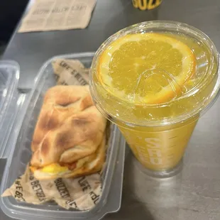 Mimosa and breakfast sandwich