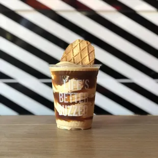 Cold brew float prepared with Best Drink Ever soft serve and topped a butter waffle cookie.