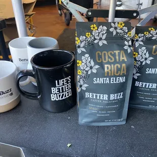 two bags of better buzz coffee on a table