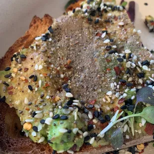 Three seed avocado toast with a crap ton of SALT AND PEPPER. didn&apos;t touch.