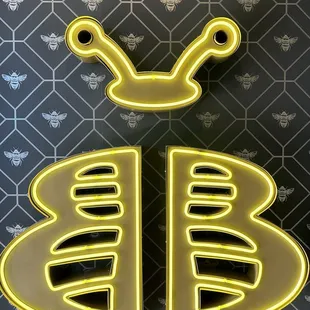 Neon sign by the bathrooms