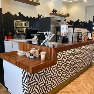 the counter area of a coffee shop