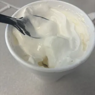 UnMilkshake with cookie dough bites and whipped cream.