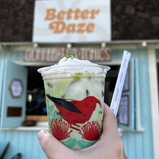 Iced coconut matcha latter with a drizzle of honey