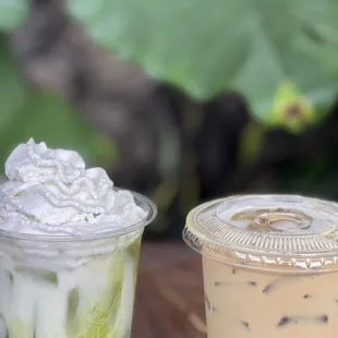 two cups of iced coffee on a table