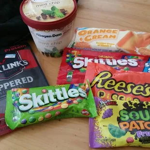 Jack Link's peppered beef jerky, Haagen-Dazs mint chip, Orange cream, Skittles: Original &amp; Sour, Reese's pieces, Sour patch fruits