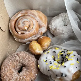 a variety of donuts in a box
