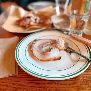 Trying the Porchetta $23. Its gave us Siu Yok/Lechon/&amp; Pastrami vibes.