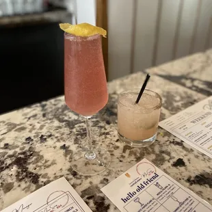 Summer seventy five and mezcal Paloma