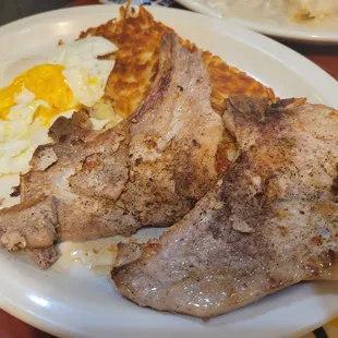 Pork chops.  Cooked to perfection even though a thin cut.