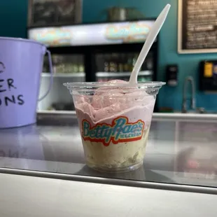 Half scoop of strawberry, half scoop of banana caramel wafer