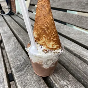 I ordered the cone on top - the joy of the waffle cone + less mess!