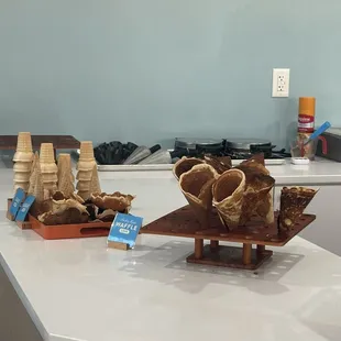 I think the cones should be behind the counter, kids kept getting very close to them