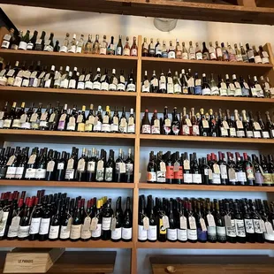 Wine bottles with handwritten note tags