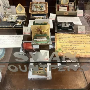 Mini writing desks that were hand-made by an artist (didn't catch their name).