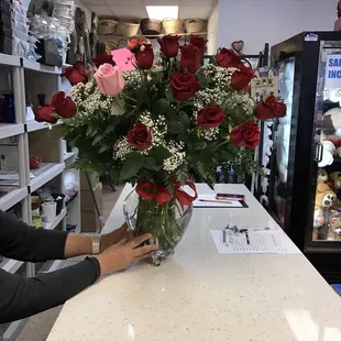 25 red roses plus 1 pink for wifey