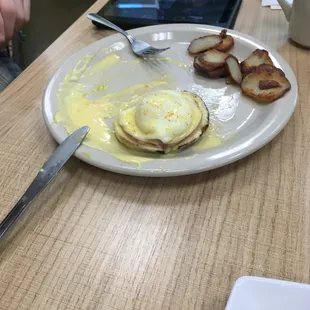 Half of his eggs Benedict