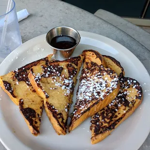 French Toast - pretty good while hot.  Slightly crisp, sweet &amp; delicious.  Great syrup.