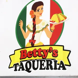 a woman holding a plate of food