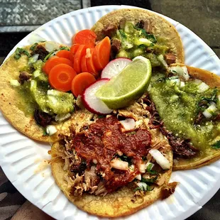 From left to right starting at 10 o&apos;clock: Tripas, Lenguas, Cabezas y Carnitas