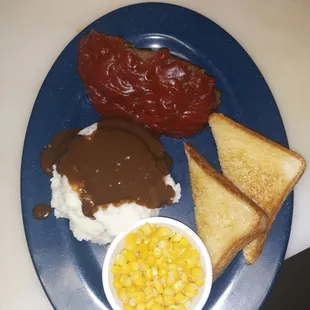 Great meatloaf, mashed potatoes w/brown gravy, delicious whole corn, Texas toast