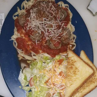 Spaghetti with homemade sauce &amp; meatballs w/shredded parmesan cheese, salad &amp; garlic toast