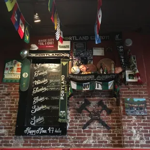 a brick wall with a sign on it